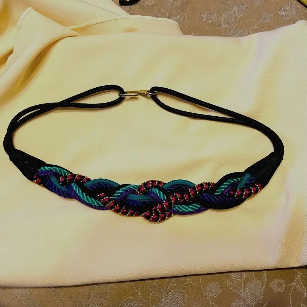 Vintage 1980s vivid multicolor women’s braided belt. OS